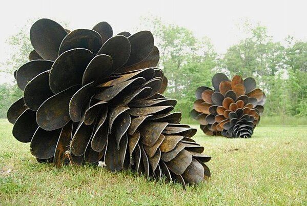 Old Shovel garden sculptures…… that is a lot of shovel heads!