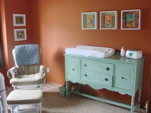 Perfect for a nursery. Use an antique buffet table as a changing table.