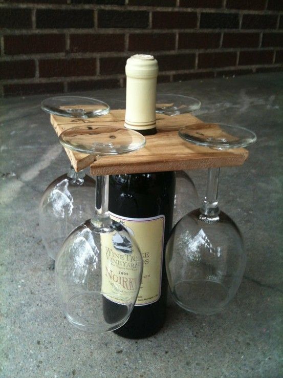A unique accessory to a favorite bottle of wine, this handmade rack will let you