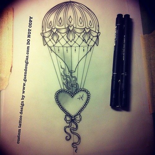 beaded heart and a hot air balloon tattoo