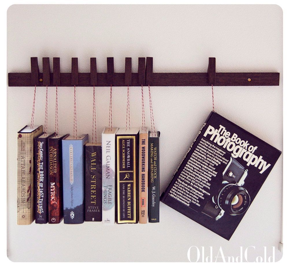 Custom made wooden book rack Movable pinsThe pins by OldAndCold