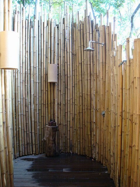 Outdoor shower. Bamboo is more resilient than wood, but still not perfect for th
