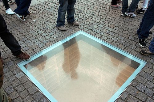Book Burning Memorial – In the center of Bebelplatz, a glass window showing rows
