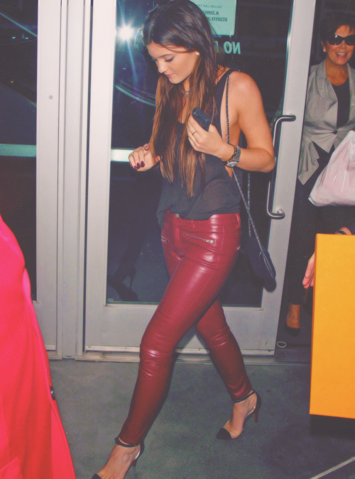 Red leather pants and a simple vest for a casual yet chic look and check out tho