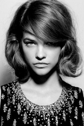 Retro hairstyle: Soft wavy bob with a low side part. Possible prom hair.