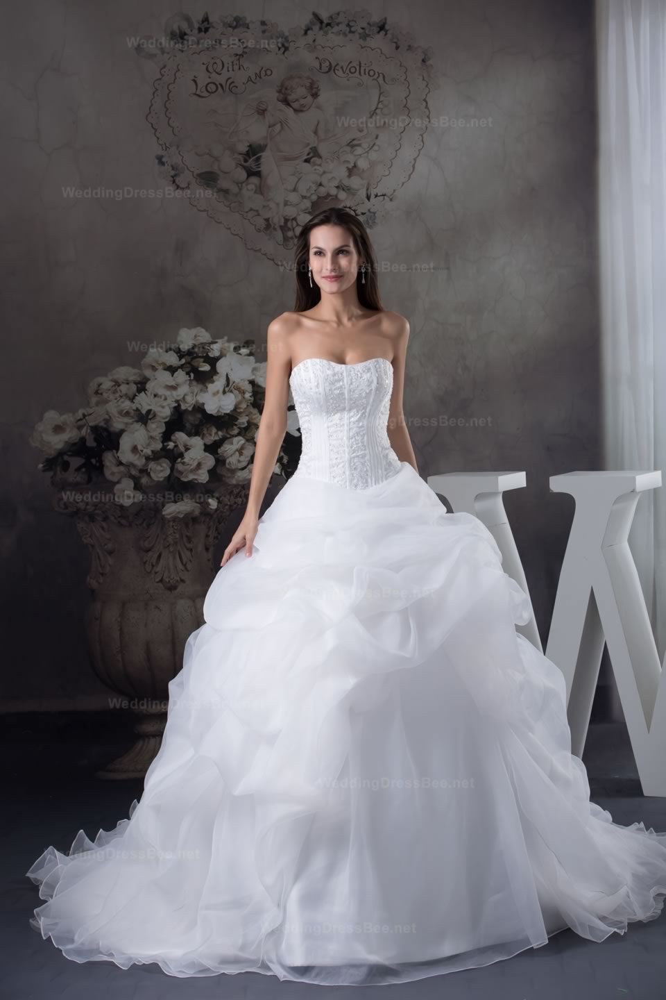 Strapless beaded embroidery top ruffled organza wedding dress. Ohhh love this!