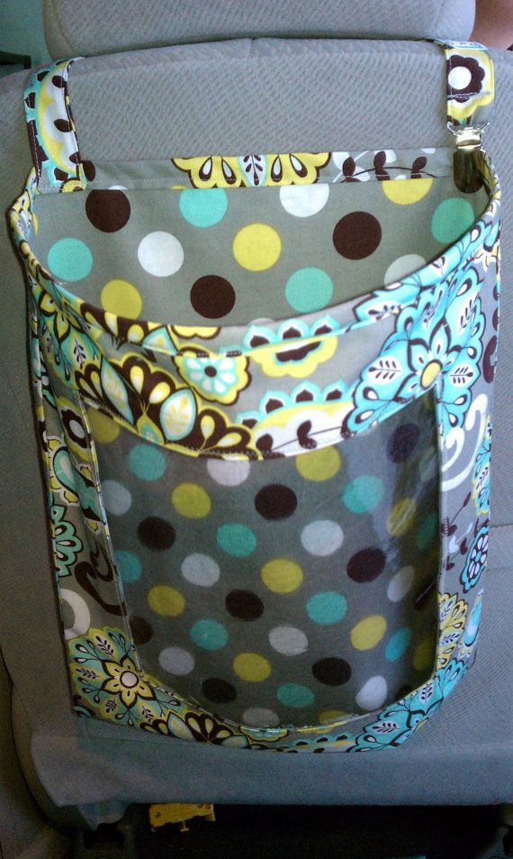 We must make this!!! Car storage bag. Kids can see everything inside, but all to