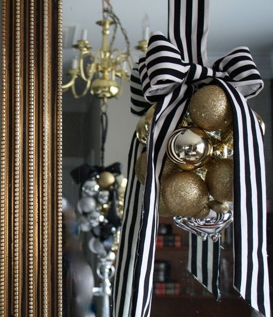 Bold striped black and white gros-grain ribbon and clustered gold tone ornaments