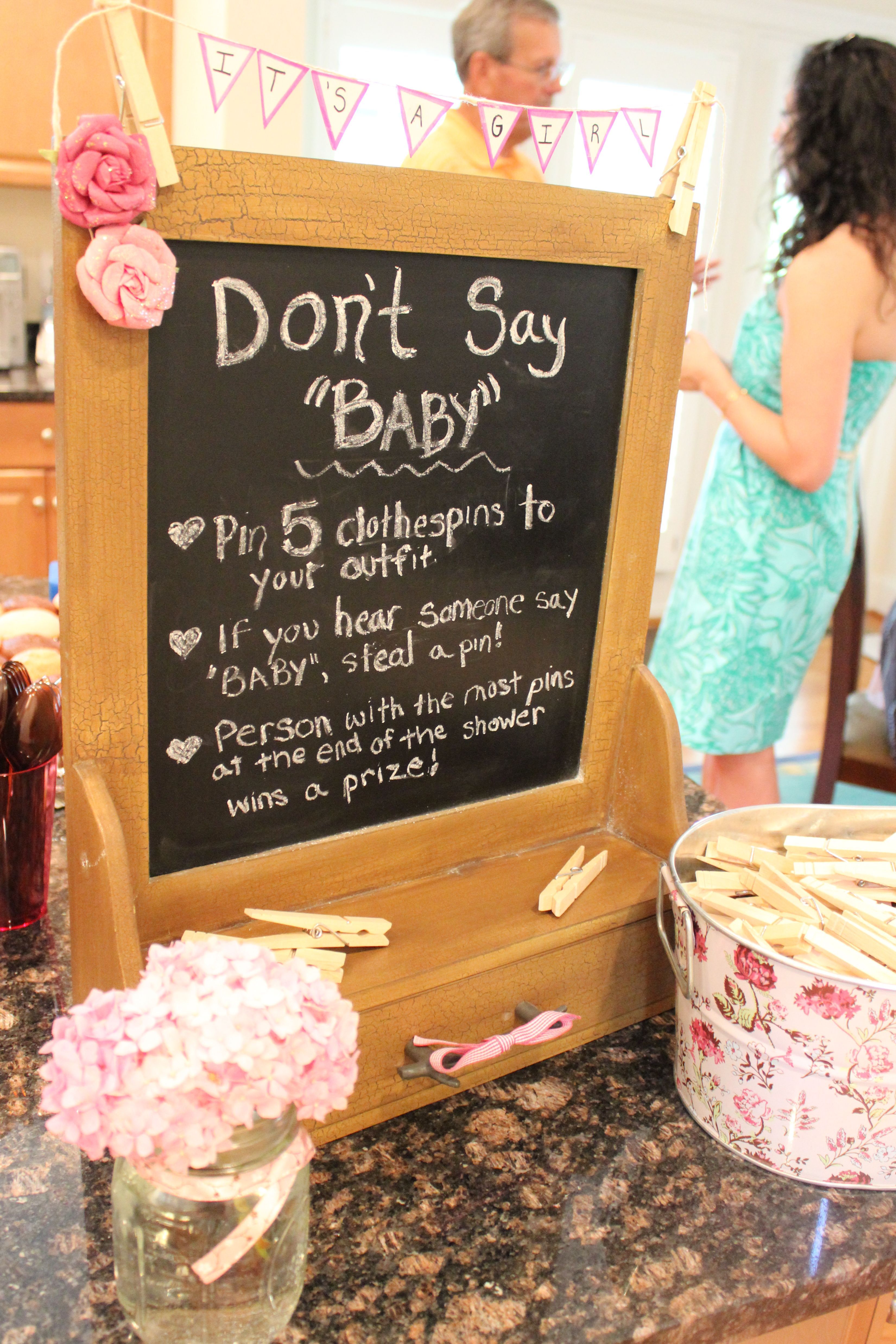 Dont say baby – shower game  I like the idea of a sign and set up.