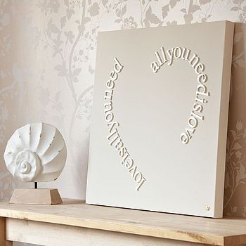 Think this could be a DIY project.  This design is made using 3d lettering in Ti