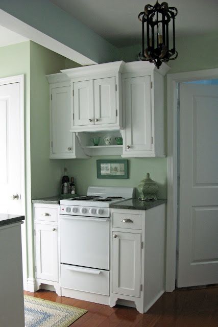 tiny kitchen redo; SUPER CUTE. 40s cottage styling. very sweet.