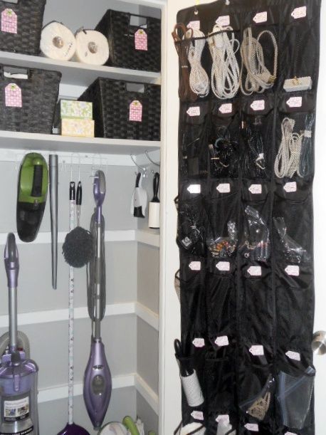 Super-organized utility closet (love the shoe organizer for cords/batteries/flas