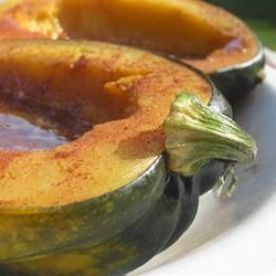A simple acorn squash soaked in and filled with brown sugar. A delicious dessert