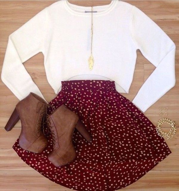 Cropped white sweater, floral skater skirt, and brown high heel booties