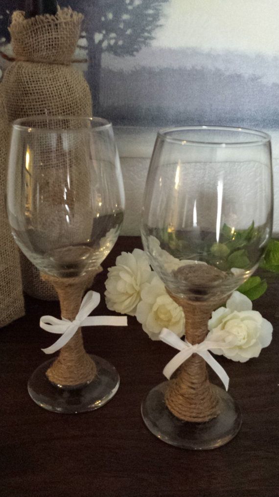 Set of wine glasses decorated with twine. Perfect for a rustic or country weddin