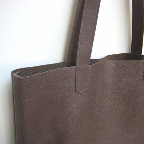 Learn how to make a beautiful simple leather tote bag with a full photo tutorial