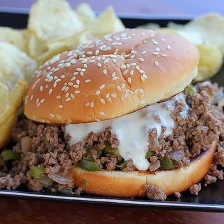 Philly Cheese Steak Sloppy Joes   1 tablespoon olive oil 1 lb ground beef 1 large onion, chopped 1 green pepper, chopped 3 tablespoons steak sauce, I like A-1 1/2 cup beef broth salt and black pepper,