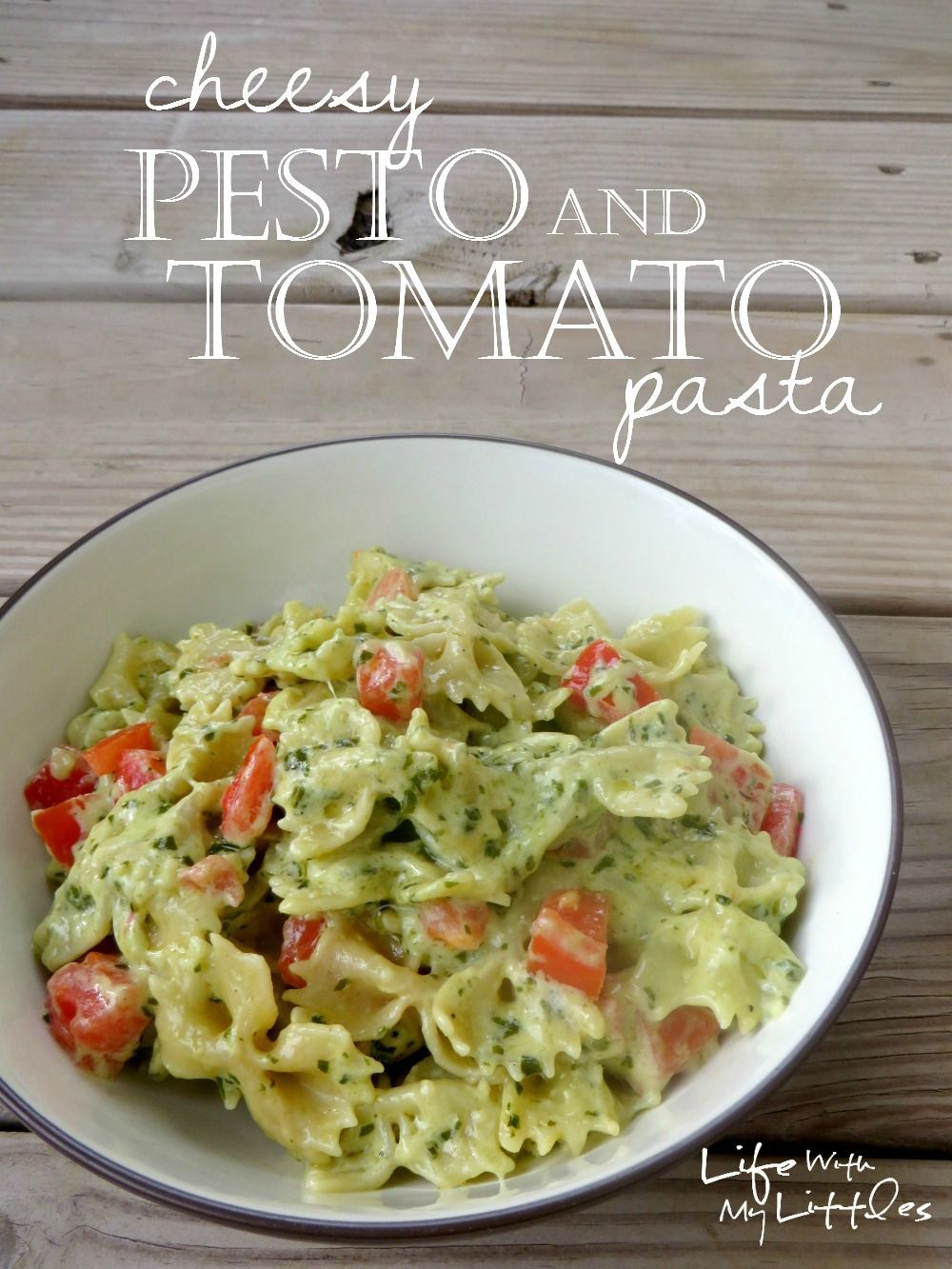 Cheesy Pesto and Tomato Pasta: A creamy, cheesy pasta made with homemade basil pesto and tossed with garden-fresh tomatoes!