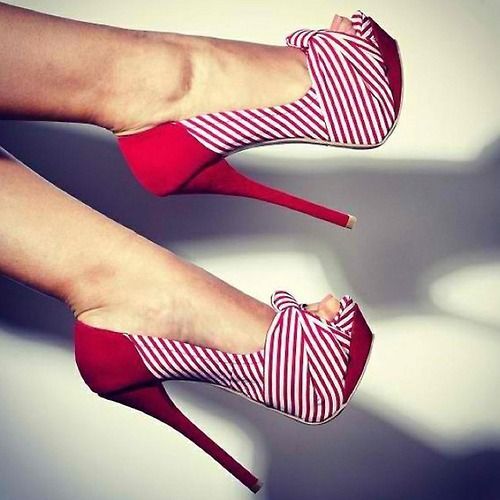 Christian Louboutin. Could I wear them without falling on my face, no….