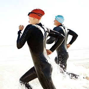 Woman doing a triathlon  Need-to-Know tips for Newbie Triathletes   10 Training tips for Triathlon Beginners