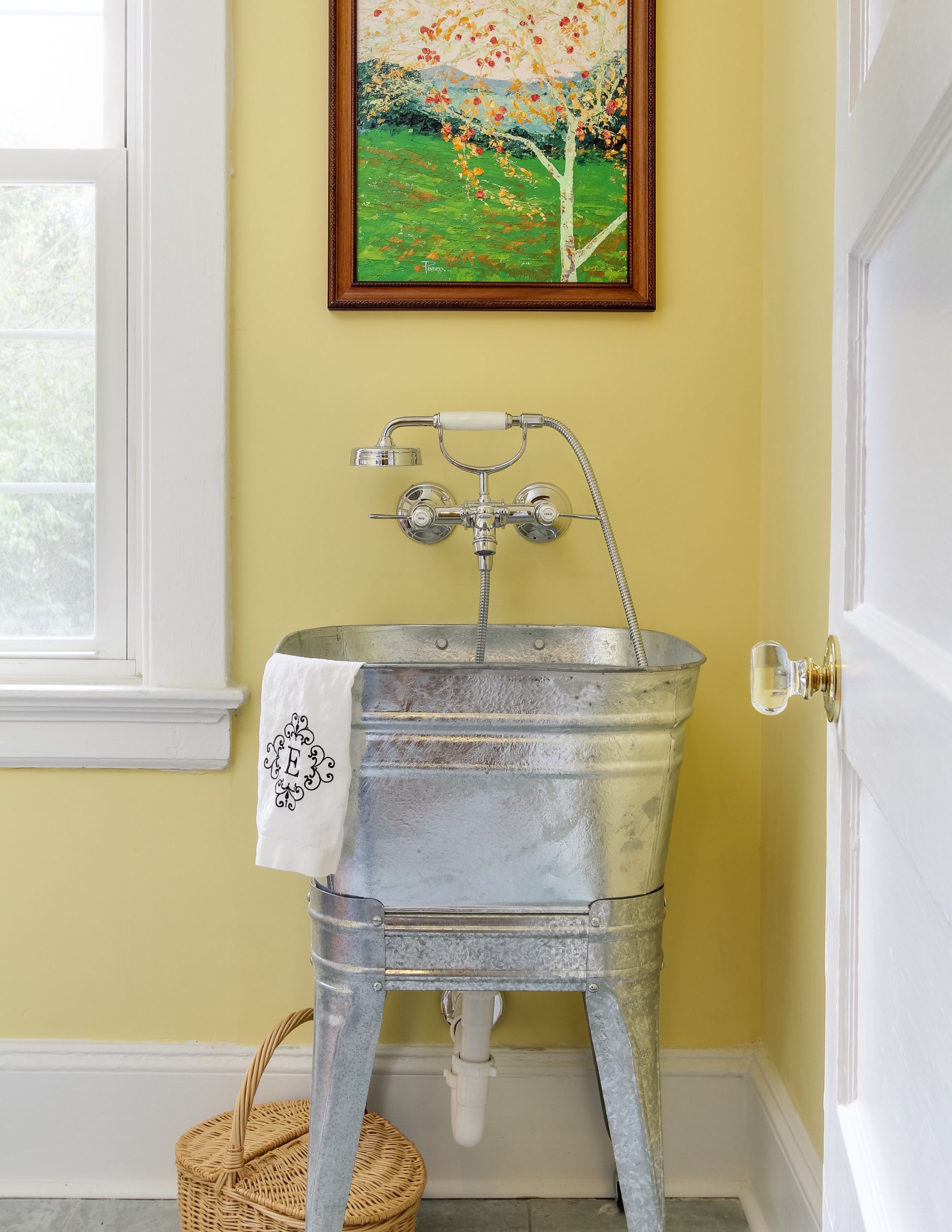 Laundry Room with vintage galvanized sink with a Hansgrohe Axor Montreux Wall Mounted tub-filler.