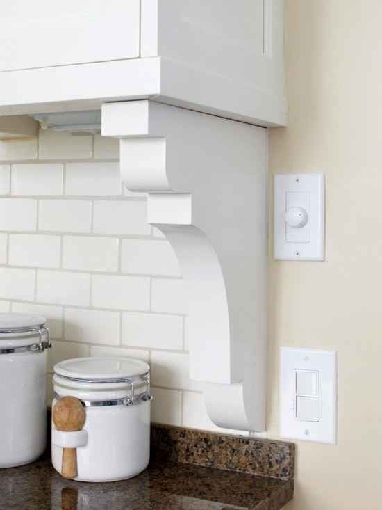 Transition your backsplash into the wall seamlessly with a shelf bracket. | 36 Genius Ways To Hide The Eyesores In Your Home