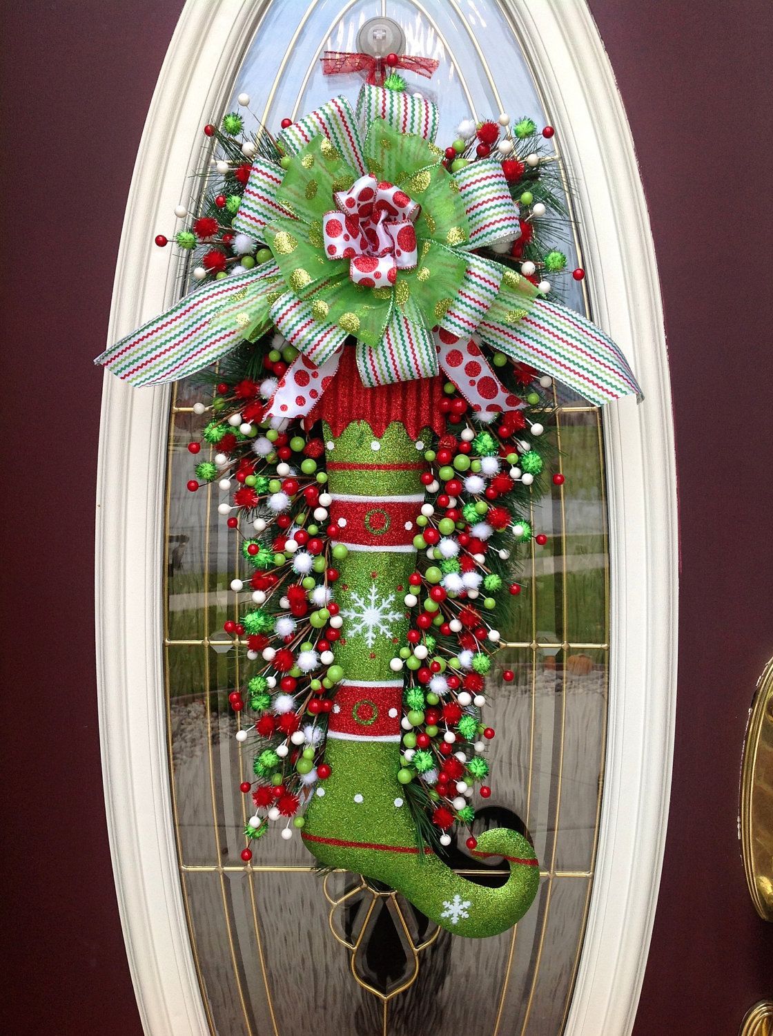 Christmas Wreath Door Wreath Teardrop Vertical Swag Decor..”Glitter Stocking”. $105.00, via Etsy.