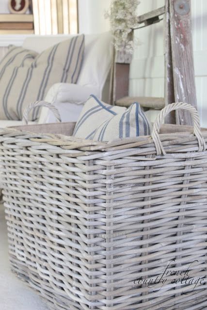 FRENCH COUNTRY COTTAGE: Chunky Baskets & French Stripe Pillows.   Take note of the wheels!!!