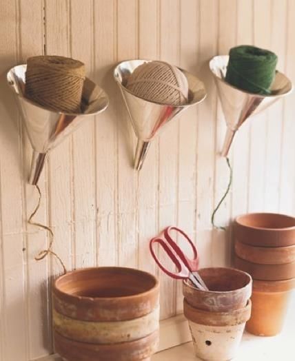 Funnels! Yes, I said funnels for yarn/twine/more twine!  Ivory Bird: Craft Room Storage Ideas