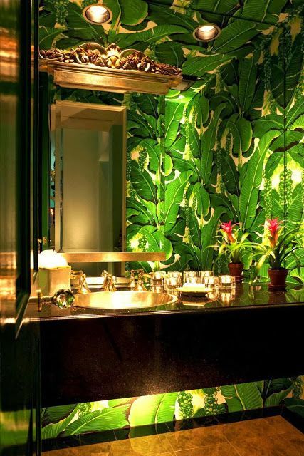 High drama is perfect in a powder room. Note under cabinet lighting.  Brazilliance  – The Glam Pad