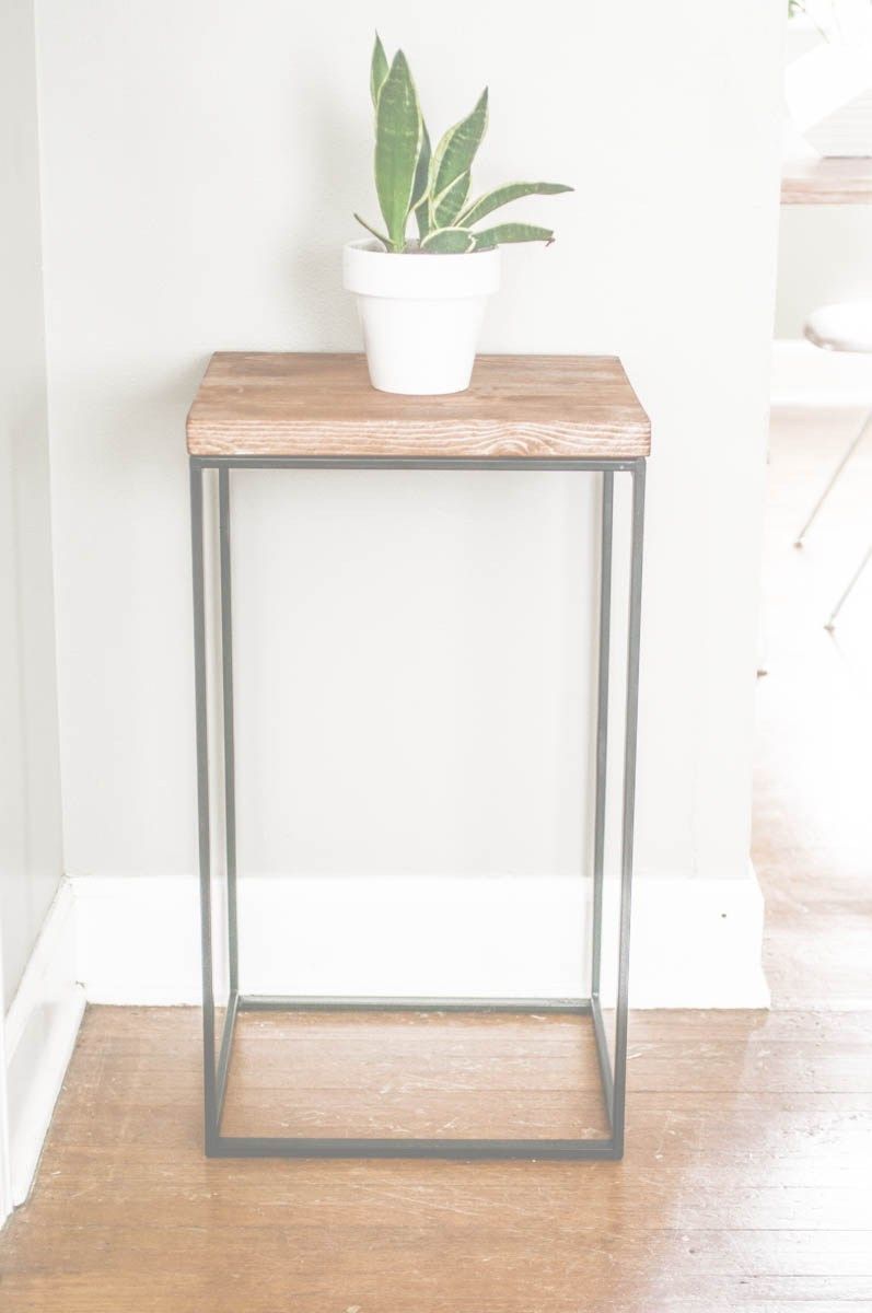 Holy cow. This girl is a genius. Just try and guess what this beautiful side table used to be! It will shock you!
