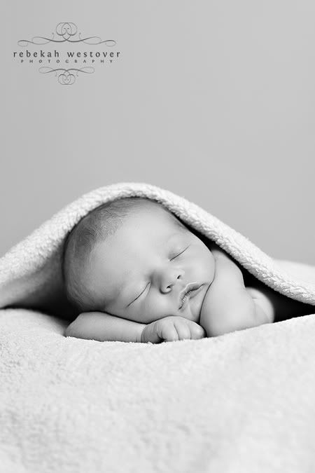 I love this baby pose.  Have you seen the one of the boys when they were babies laying on their bellies?  It is my favorite on of