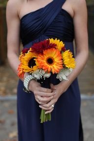 I think I might prefer this color for the bridesmaid dresses and I actually really the sunflowers for a bouquet.