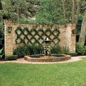 Im so doing this! Confederate Jasmine vine on a blank brick wall in a diamond or harlequin pattern–love it!