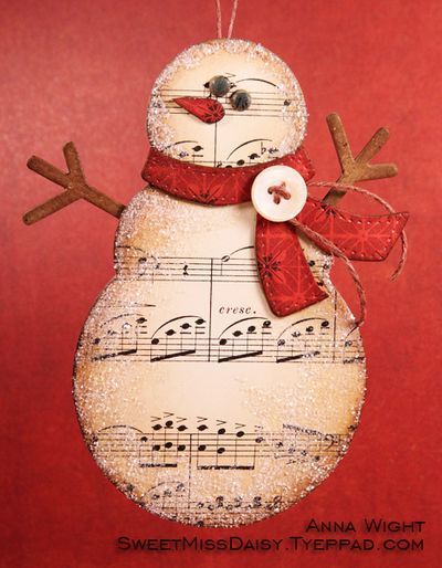 Music Paper Snowman. how about a message “may you have a song in your heart throughout the season” or something similar