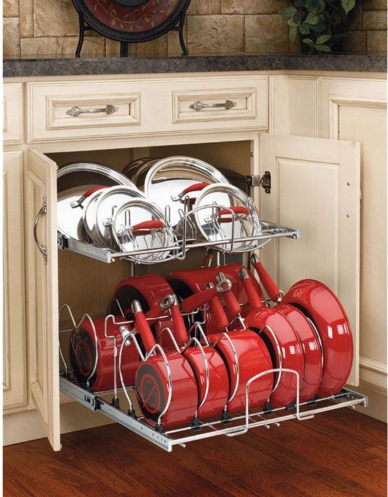 Organized Pots & Pans Storage! This is a really easy, great way to store store pots and lids. With a place for every piece it’s