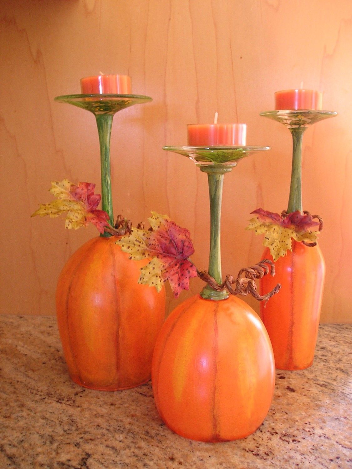 Pumpkin Patch Wine Glass Candle Holders…wine glasses painted like pumpkins and used as candle holders
