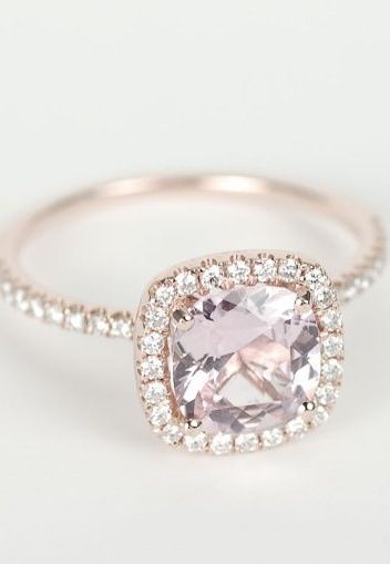 The slight champagne color on this ring and the stones color is so beautiful and unique!