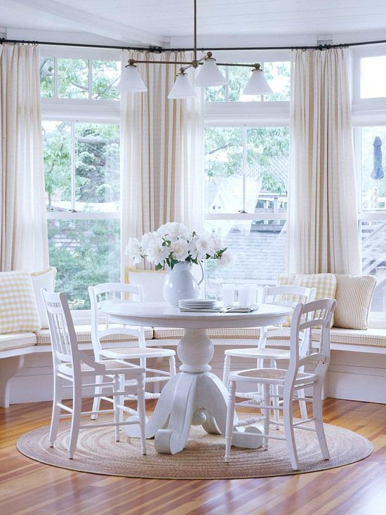 They say life happens around the kitchen table, and I have to agree. I love the circular feel of this dining space. It reminds me
