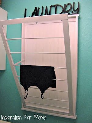 Brilliant!!! DIY pull down drying rack for laundry room for those shirts you cant put in the dryer