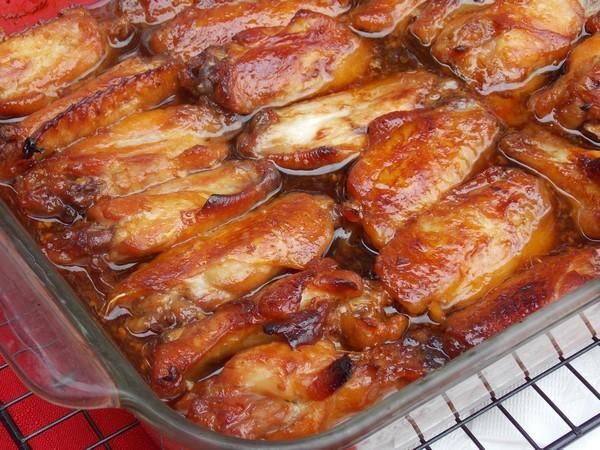 Caramelized Baked Chicken Legs/Wings- used maple syrup instead of honey. baked at 400 x 30 minutes then reduced to 325 for 15 min