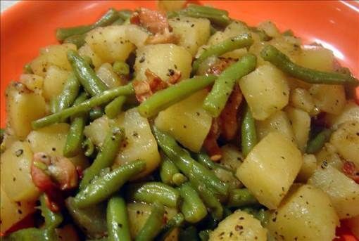 Crockpot Ham, Green Beans and Potatoes and onion, add everything to the pot and cook on low for six hours. Add salt and pepper ,