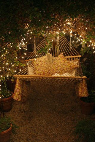 DIY:  Adding Christmas lights is an easy & inexpensive way to add lighting and ambience to your back yard. Inspiration.