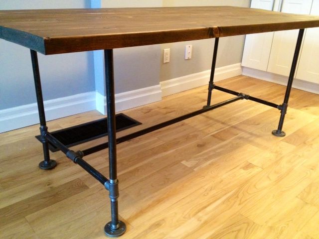 Great details, including supply list, for a DIY table with plumbing pipe legs and trestle.