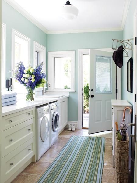 Great idea for a mud room.  Enter, throw everything in the laundry and do not track anything into the house!! :)