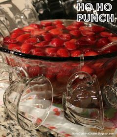 Ho Ho Punch: 1 bottle of chilled champagne, 1 bottle of chilled ginger ale, and 2 packages of frozen strawberries, partially