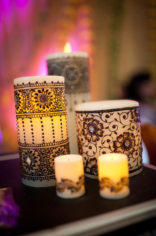 I really want to try to make this! Mendhi Candles with jewels! Great center pieces.