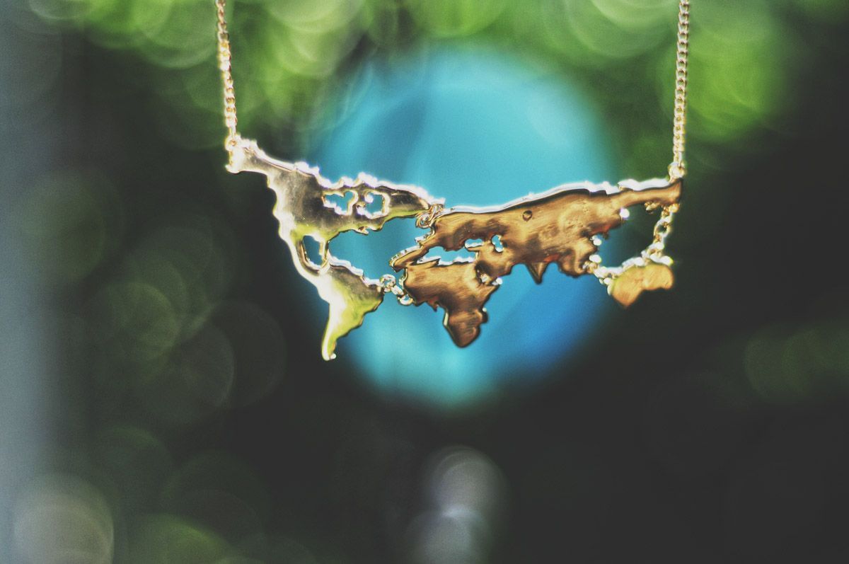 Ive got the world on a string…well, chain.  World Map Necklace – Seattles Travel Shop