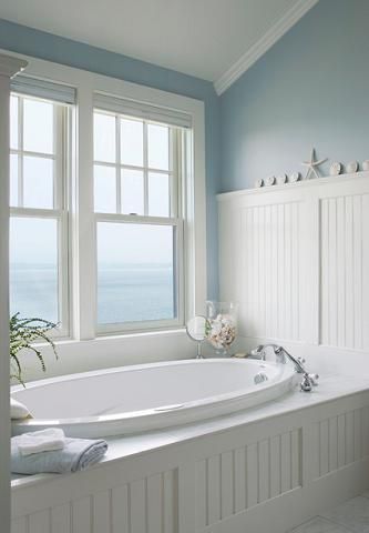 Just A Touch Of Blue Can Draw The Sky And Seascape Into A Well Lit Bathroom (by Connor Homes)