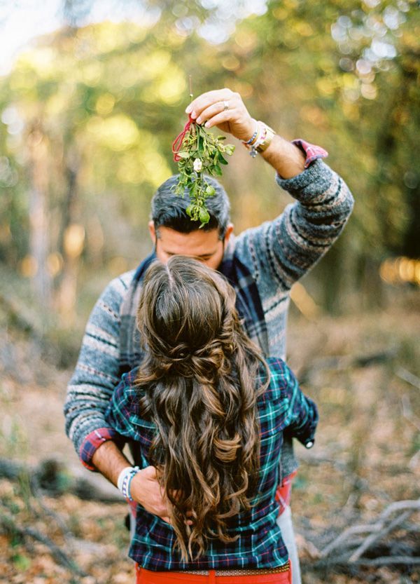 Love the hair. Love the mistletoe. Love the picture…. Thinking about stringing some mistletoe between the trees in the front